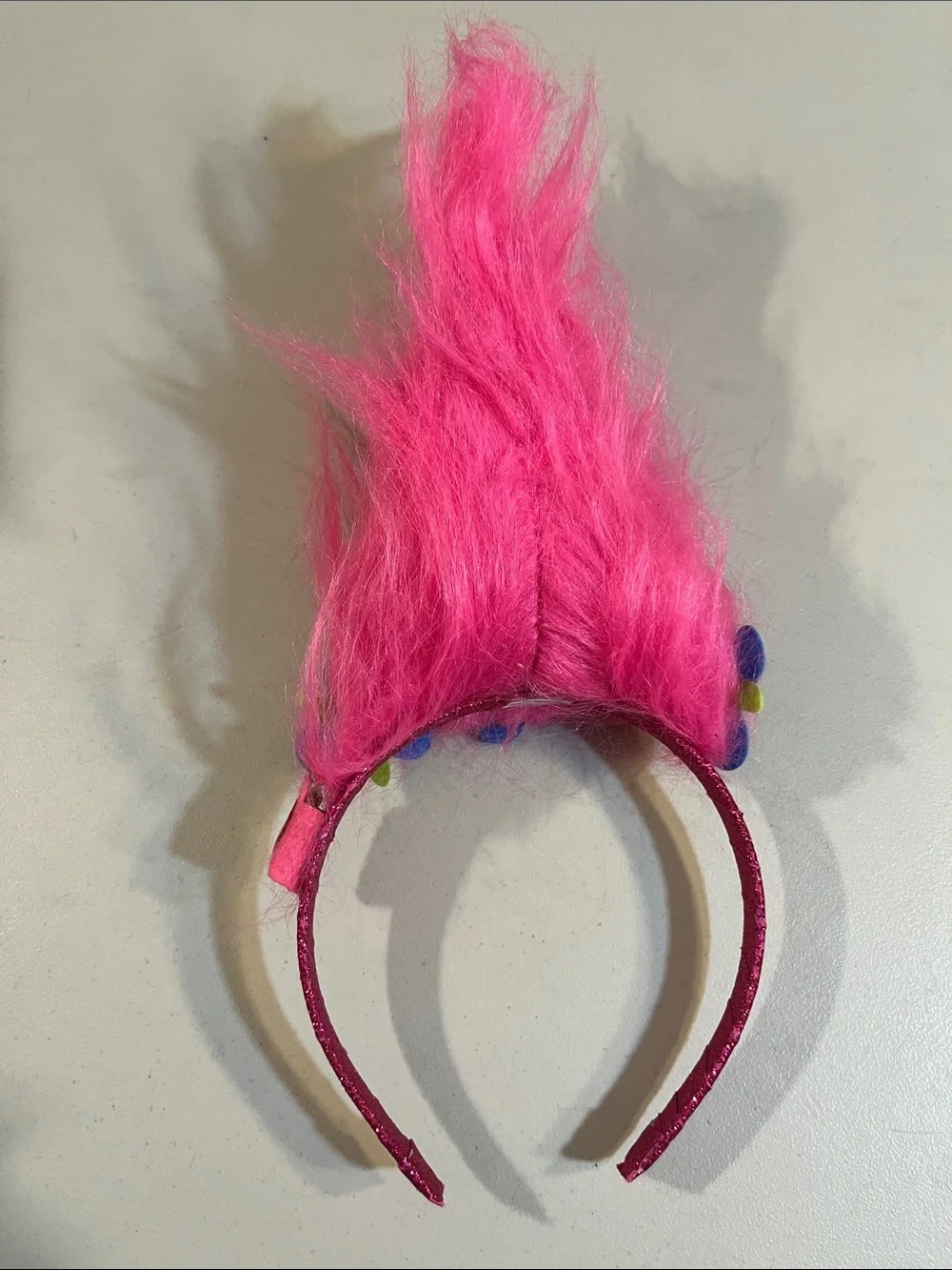 Trolls Bright Pink Faux Fur Headband with Blue and Lime Flowers